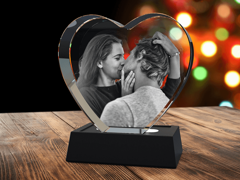 loving couple engraved in a 3d photo crystal heart
