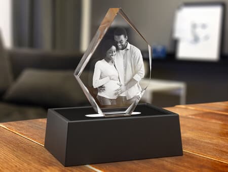 Pregnant mom and husband image laser engraved in a 3D crystal.